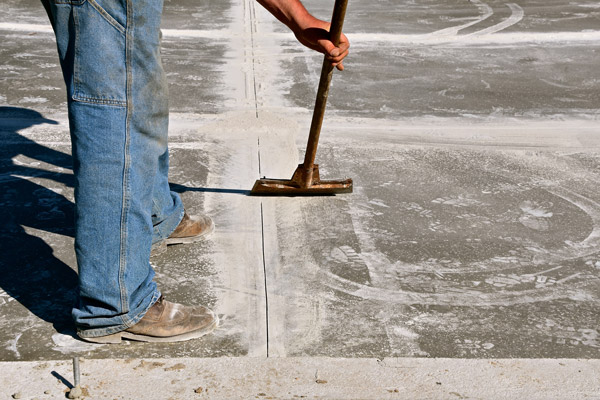 A Construction Worker Cleans Unit