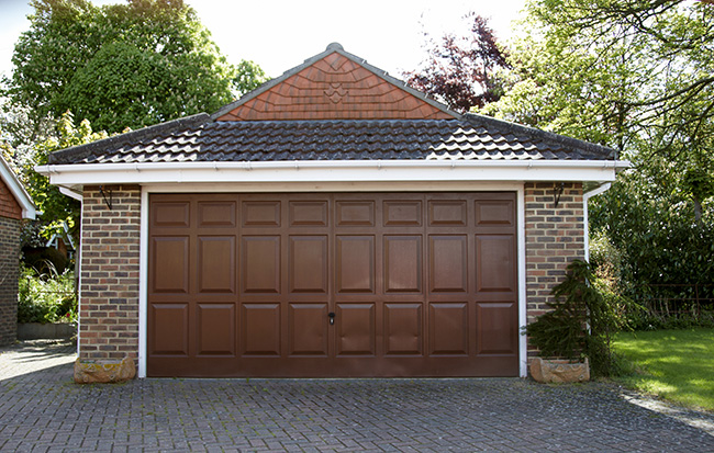 detached garage made out of brick siding