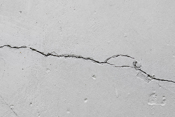 cracked cement garage wall