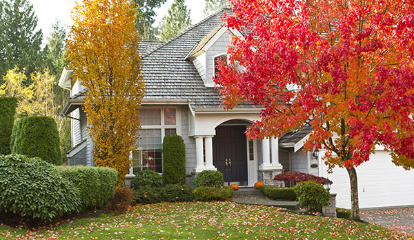 fall season suburban home and garage