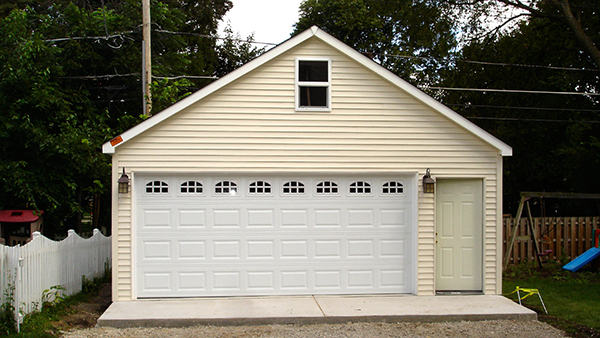 fix dented garage door