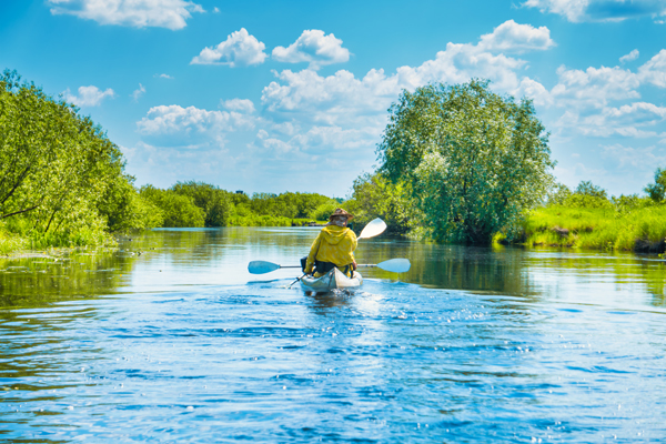 Couple At Kayak Trip On Blue R