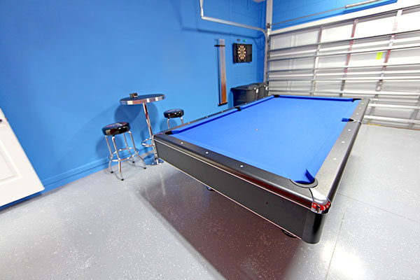 garage man cave with a pool table