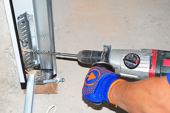 man is rebuilding a garage