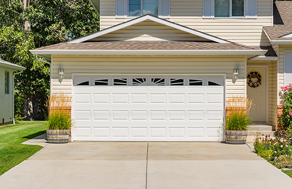 beautiful garage with white door