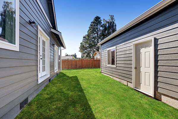 matching vinyl siding on detached garage and house