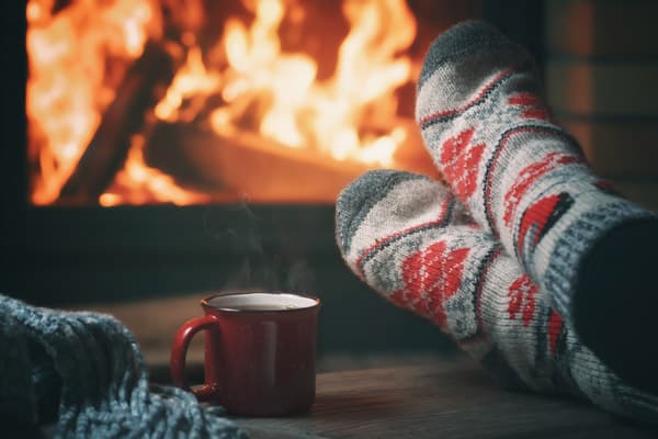 Girl Resting And Warming Her Feet